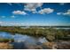 A stunning view of the marshland with a pond surrounded by greenery at 6315 Shoreline Dr # 3305, Madeira Beach, FL 33708