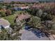 Aerial view of the home showing the tile roof, landscaping, and cul-de-sac at 9101 Highland Ridge Way, Tampa, FL 33647