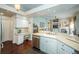 Spacious kitchen with a breakfast bar overlooking the living area, featuring modern appliances and ample counter space at 9101 Highland Ridge Way, Tampa, FL 33647