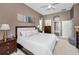 Spacious main bedroom with ensuite bathroom, walk-in closet, and neutral decor at 9101 Highland Ridge Way, Tampa, FL 33647