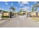 Symphony Isles gated community entrance with lush landscaping at 944 Symphony Isles Blvd, Apollo Beach, FL 33572