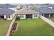 Aerial view of large backyard and screened patio, showcasing the property's outdoor space at 9645 Little Bluestem Dr, Land O Lakes, FL 34637