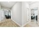 Hallway leading to various rooms at 9645 Little Bluestem Dr, Land O Lakes, FL 34637