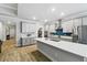 Spacious kitchen featuring an island, stainless steel appliances, and ample counter space at 9645 Little Bluestem Dr, Land O Lakes, FL 34637
