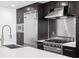 A modern kitchen featuring stainless steel appliances and a large center island at 1120 E Kennedy Blvd # 1126, Tampa, FL 33602