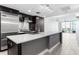 A modern kitchen with a large island, stainless steel appliances, and an open layout at 1120 E Kennedy Blvd # 1126, Tampa, FL 33602