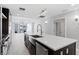 A spacious modern kitchen boasts a large island, stainless steel appliances, and ample lighting at 1120 E Kennedy Blvd # 1126, Tampa, FL 33602