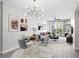 A stylish living and dining space features contemporary decor and a beautiful view at 1120 E Kennedy Blvd # 1126, Tampa, FL 33602