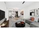 Open concept living room seamlessly connects to dining area and modern kitchen at 1120 E Kennedy Blvd # 1126, Tampa, FL 33602