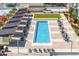 Rooftop pool with lounge chairs, and green recreation area for community members at 1120 E Kennedy Blvd # 1126, Tampa, FL 33602