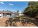Inviting screened-in pool area with a sparkling blue pool and ample space for lounging and enjoying the outdoors at 11304 Sedgefield Ave, Spring Hill, FL 34608