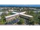 Exterior aerial view of the condo building, landscaping and surrounding parking areas at 2041 Australia W Way # 35, Clearwater, FL 33763