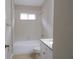 Clean bathroom featuring a tub/shower, granite countertops, and tile floors at 3147 Sunwatch Dr, Wesley Chapel, FL 33544