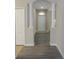 Inviting foyer with decorative columns, light walls and new flooring at 3147 Sunwatch Dr, Wesley Chapel, FL 33544
