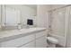 Bathroom with shower and vanity with white cabinets and hardware at 3313 Pleasant Willow Ct, Brandon, FL 33511