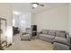 Spacious living room featuring plush seating and ample natural light at 3313 Pleasant Willow Ct, Brandon, FL 33511