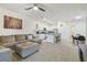 Bright and open living space with kitchen and dining area, ideal for modern living at 3313 Pleasant Willow Ct, Brandon, FL 33511