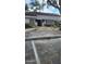 Exterior view of a gated entrance to the pool area with a landscaped walkway at 5162 Puritan Cir # 5162, Tampa, FL 33617