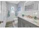 Bright bathroom with updated vanity, stylish fixtures, and coastal-themed decor at 6537 8Th N Ave, St Petersburg, FL 33710