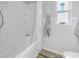 Clean bathroom with white tiled tub and coastal decor at 6537 8Th N Ave, St Petersburg, FL 33710