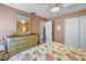 Bedroom featuring a dresser with a mirror and closet space at 6537 8Th N Ave, St Petersburg, FL 33710