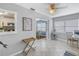 Spacious dining area with tiled flooring, natural light, a view into the kitchen, and stylish decor at 6537 8Th N Ave, St Petersburg, FL 33710