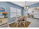 Cozy dining area with a charming table setting and bright window at 6537 8Th N Ave, St Petersburg, FL 33710
