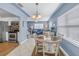 Light-filled dining room with views of the adjacent kitchen and comfortable living space at 6537 8Th N Ave, St Petersburg, FL 33710