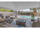 Comfortable outdoor living space with a screened-in patio and a clear view of the inviting pool at 6537 8Th N Ave, St Petersburg, FL 33710