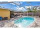 Beautiful screened-in pool and outdoor entertaining area provides privacy and enjoyment at 6537 8Th N Ave, St Petersburg, FL 33710