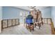 Dining room with a ceiling fan and sliding glass doors for indoor-outdoor living at 7984 1St S Ave, St Petersburg, FL 33707