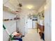 Functional laundry room with washer, dryer, shelving, and storage solutions for organization at 8174 Terrace Garden N Dr # 307, St Petersburg, FL 33709