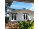 The backyard area features a nice wooden deck, which is ideal for outdoor relaxation and enjoyment at 1001 W Baker St, Plant City, FL 33563