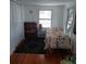 Bedroom with hardwood floors, white walls, and large windows at 1001 W Baker St, Plant City, FL 33563