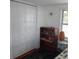 Bright bedroom featuring closet, books, and charming decor at 1001 W Baker St, Plant City, FL 33563