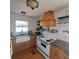 Charming kitchen featuring a farmhouse sink, wood cabinets, and butcher block countertops at 1001 W Baker St, Plant City, FL 33563