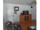 Comfortable living room featuring a TV and entertainment center at 1001 W Baker St, Plant City, FL 33563