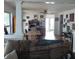 Open concept living room and dining area with hardwood floors and lots of natural light at 1001 W Baker St, Plant City, FL 33563