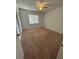 Spacious bedroom with neutral carpet and a window offering natural light at 106 Lakeside Ct, Oldsmar, FL 34677
