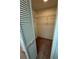 Walk in closet with carpet flooring and shelving for efficient storage at 106 Lakeside Ct, Oldsmar, FL 34677