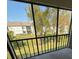 Screened patio with a lush, landscaped view at 106 Lakeside Ct, Oldsmar, FL 34677