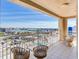 Balcony with great views of the city and waterway with seating area at 11 San Marco St # 807, Clearwater Beach, FL 33767