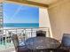 Balcony with seating offers serene ocean views at 11 San Marco St # 807, Clearwater Beach, FL 33767