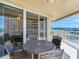 Relax on this condo balcony with seating and enjoy beautiful views of the bay at 11 San Marco St # 807, Clearwater Beach, FL 33767