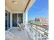 Charming balcony with wicker seating offers stunning city views and relaxing outdoor space at 11 San Marco St # 807, Clearwater Beach, FL 33767