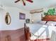 Comfortable Primary bedroom suite features a four poster bed and sleek flooring at 11 San Marco St # 807, Clearwater Beach, FL 33767