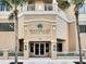 An exterior shot of Mandalay Beach Club with an elegant entrance at 11 San Marco St # 807, Clearwater Beach, FL 33767