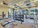 Well-equipped gym with modern equipment, ceiling fans, and natural light at 11 San Marco St # 807, Clearwater Beach, FL 33767