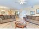 Cozy living room features plush sofas, elegant decor, and an open concept design at 11 San Marco St # 807, Clearwater Beach, FL 33767
