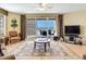 Bright and airy living room with furniture and balcony access overlooking the ocean at 11 San Marco St # 807, Clearwater Beach, FL 33767